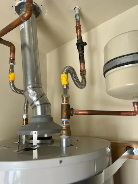 Water heater installation and plumbing repair in Janvier